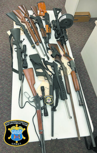 Firearms seized at home of convicted felon in Alger County